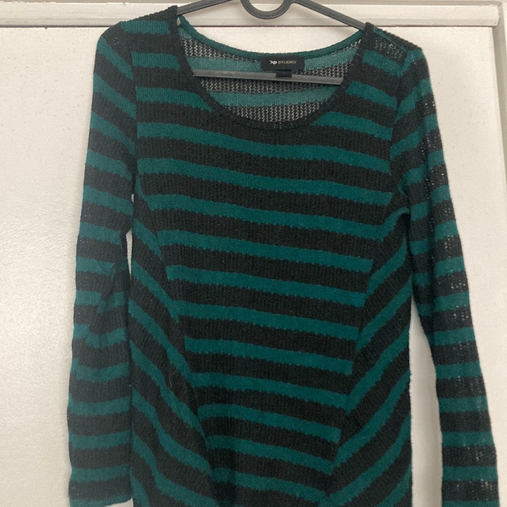 Green and black striped long sleeve.